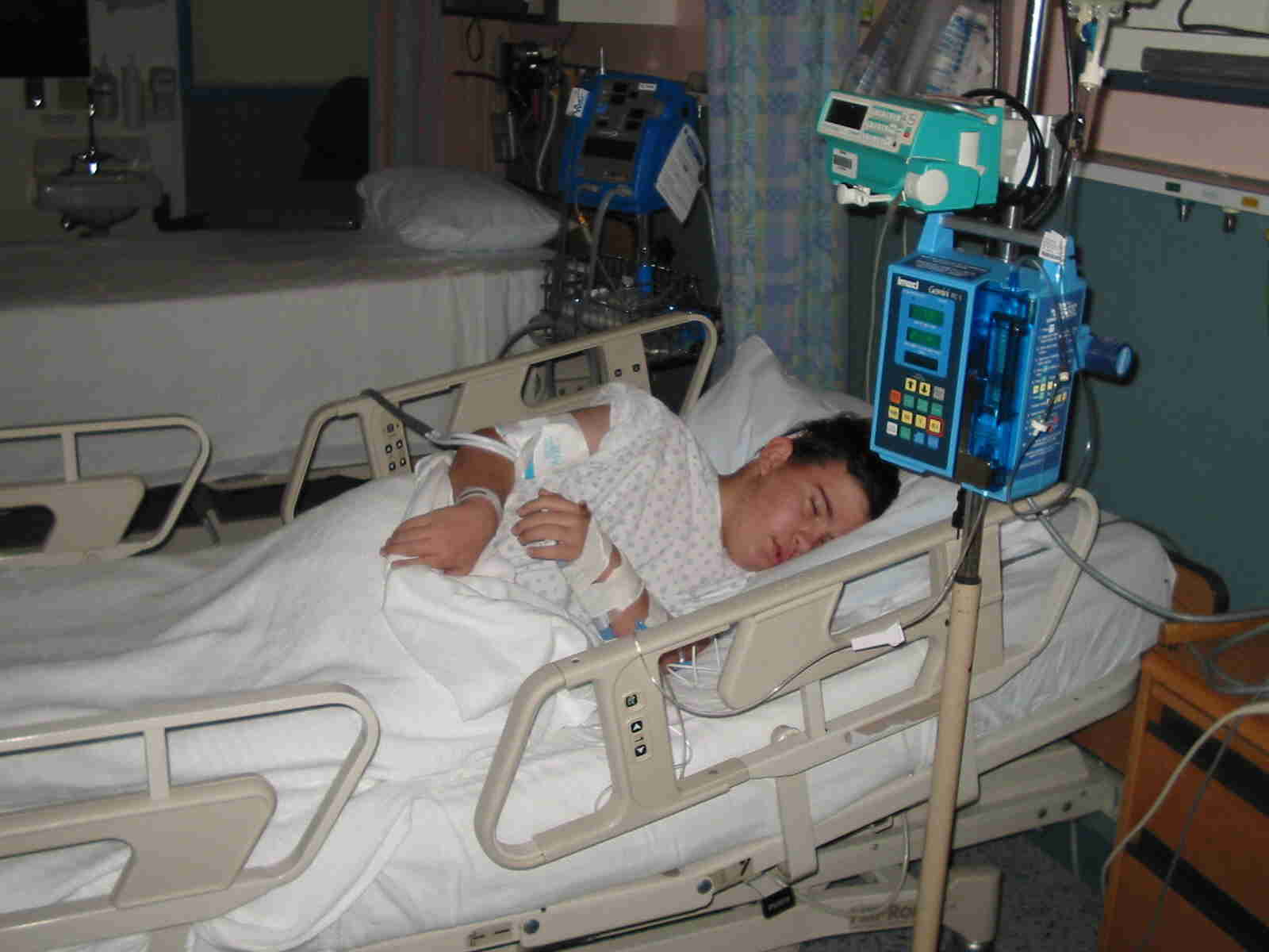 Isaac resting in the hospital bed after his brain surgery on Dec. 11th, 2003